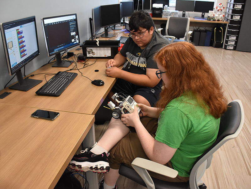 Area high school students learn about robotics at summer camp