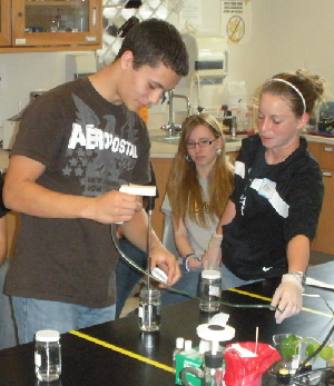 Martin Armenta takes part in an experiment at the UHV with Kori Kocian- a UHV biology major