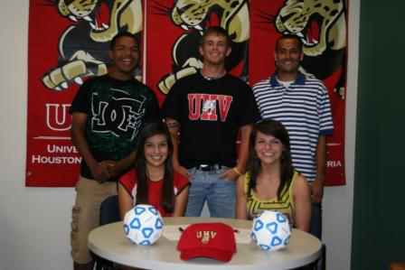 Five Victoria-area soccer players sign on Wednesday to play in the fall with the first University of Houston-Victoria Jaguars soccer teams. Seated, from left, are Stacie Garcia and Courtney Day, and standing, from left, are Mark Rojas, Seth Prochaska and Stiven Ospina.