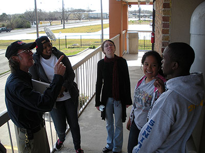 Gerald Kelley, Jaguar Hall maintenance supervisor, points out safety features to Resident Advisers Lauren Clark, left, Anita Strange, Ashley Kellis-Carr and Moses Olukoya.