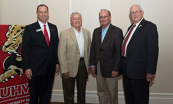 Jesse Pisors, left, UHV vice president for advancement and external relations; stands with Buddy Brock, an M.G. and Lillie A. Johnson Foundation board member; Robert Halepeska, executive vice president for the foundation; and UHV President Vic Morgan