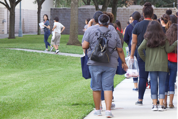 Prospective students and their families take a guided tour of campus