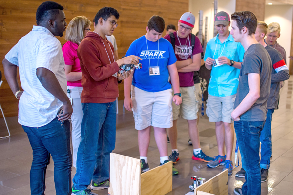 High school students listen to a presentation on robots during the 2017 UHV Math & Robotics Awareness Day event